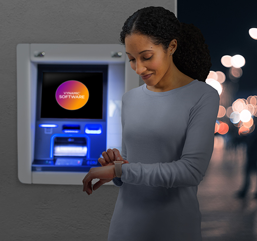 Woman checking watching standing in front of ATM