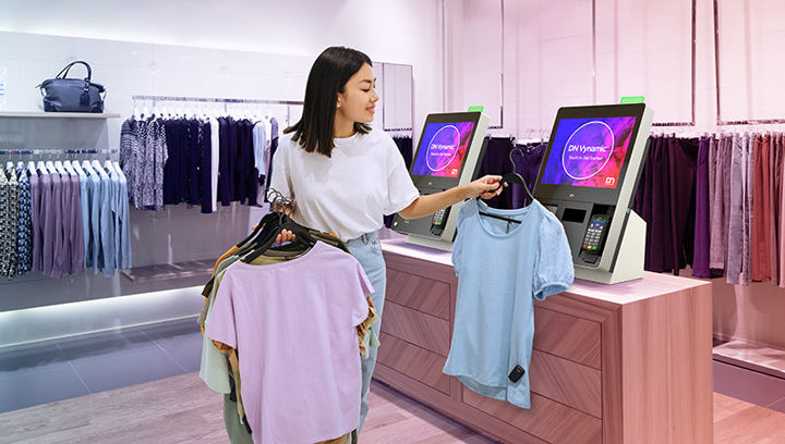 lady scanning clothes with DN Series EASY eXpress