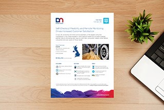 Diebold Nixdorf 's Co-Op UK case study lays on top of a desk next to a laptop